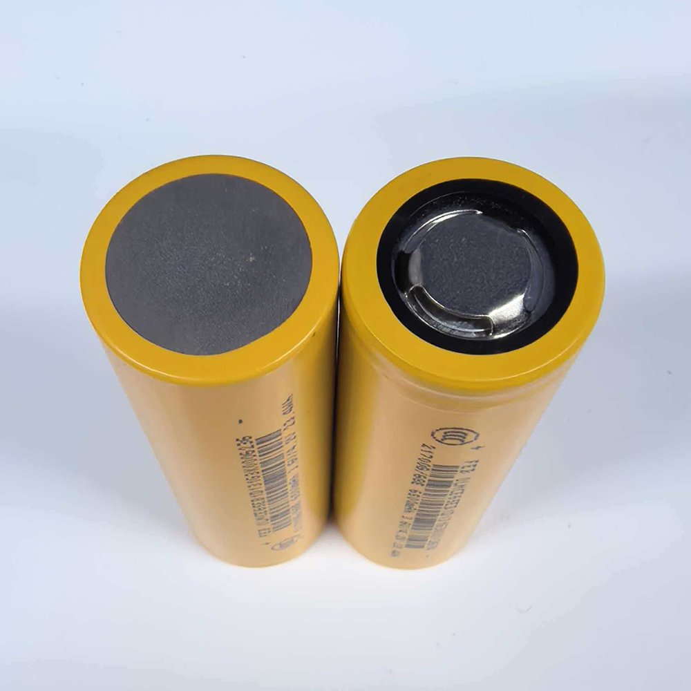 FEB 21700 68E lithium-ion cell showing positive and negative terminals