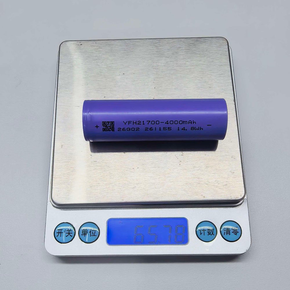 YFH INR21700 40Q 21700 lithium-ion cell weight check on digital scale