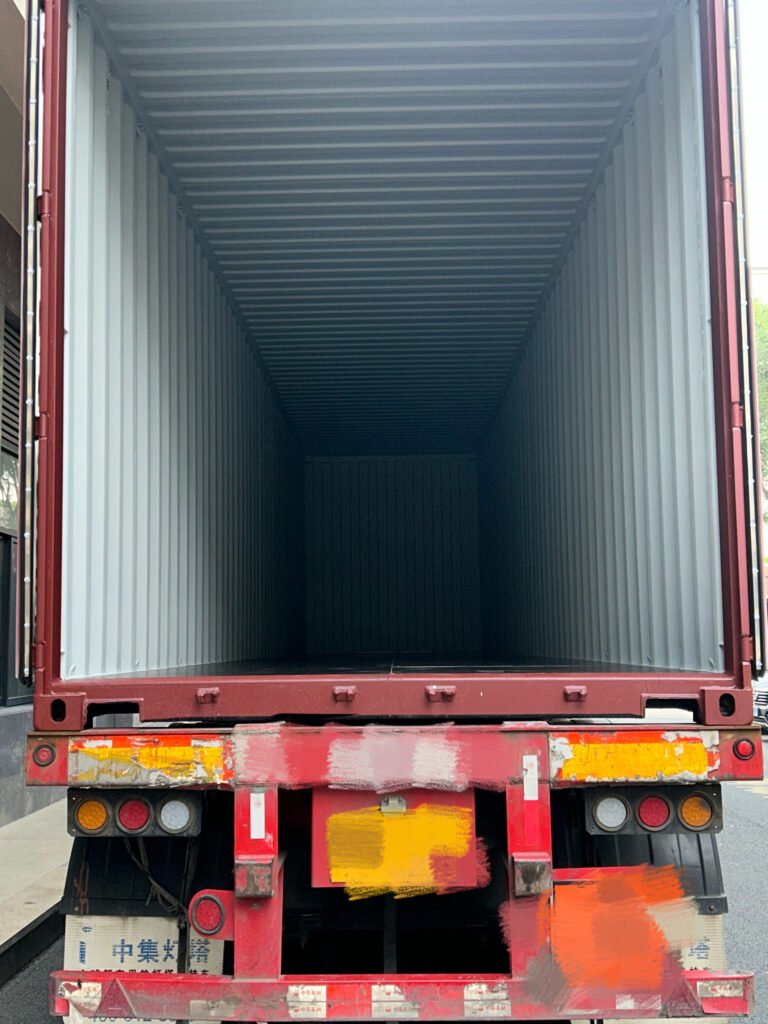 Empty interior view of a shipping container prepared for loading SK On E777 battery cells.