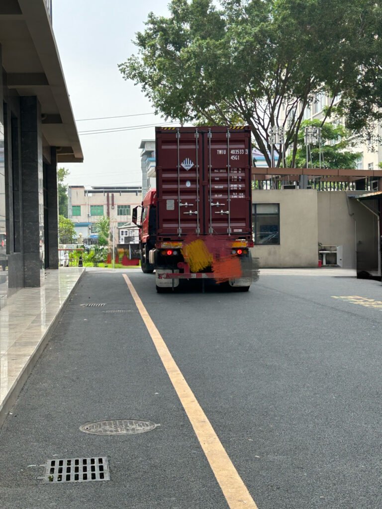 A truck with a loaded shipping container ready for departure, carrying SK On E777 lithium-ion battery cells.