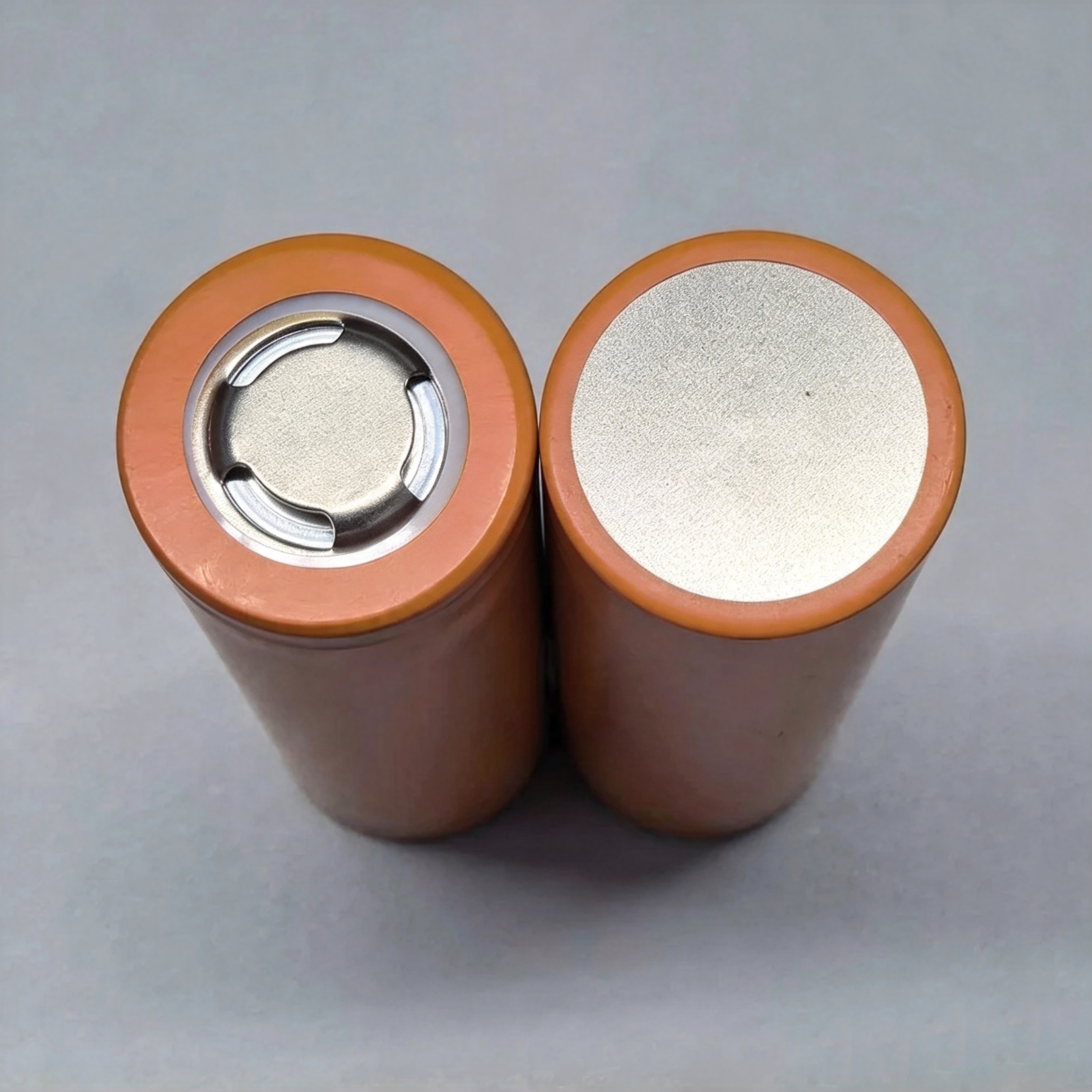 TENPOWER 21700 58HE 21700 lithium-ion cell showing positive and negative terminals