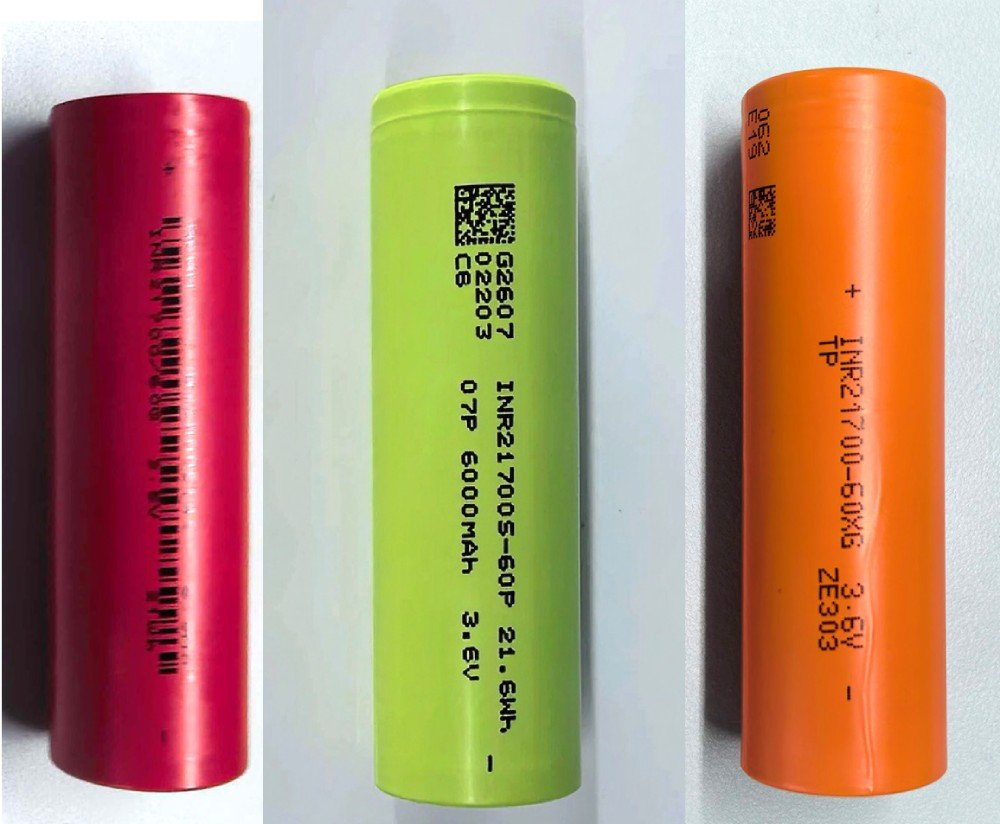 Side-by-side comparison of four 21700 6000mAh lithium-ion cells: TENPOWER INR21700-60XG, LinkData INR21700S-60P, Amprius INR21700/60Q, and Great Power INR21700/60Q.